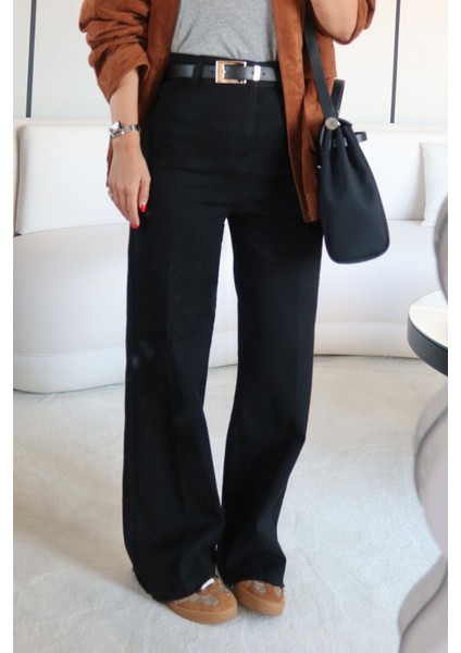 Paçası Kesik Deri Kemerli Jean modelleri