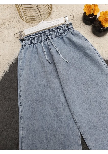 Bol Paça Beli Lastikli Bağcık Detaylı Kot Pantolon -Buz Mavi fiyatları