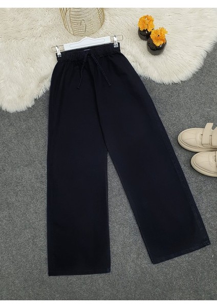 Bol Paça Beli Lastikli Bağcık Detaylı Kot Pantolon -K.laci fiyatları
