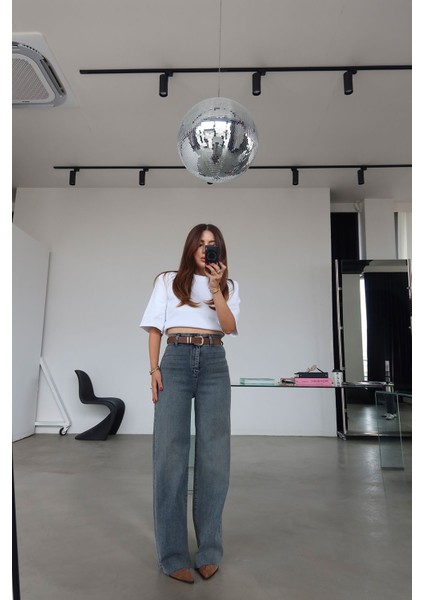 Paçası Kesik Deri Kemerli Jean fiyatları