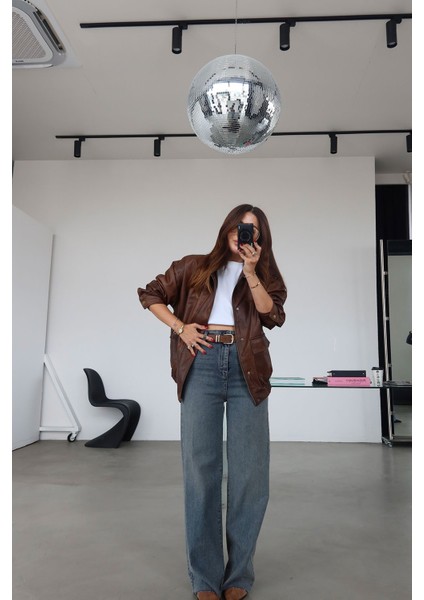 Paçası Kesik Deri Kemerli Jean indirimleri