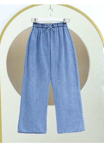 Bol Paça Beli Lastikli Bağcık Detaylı Kot Pantolon -Mavi