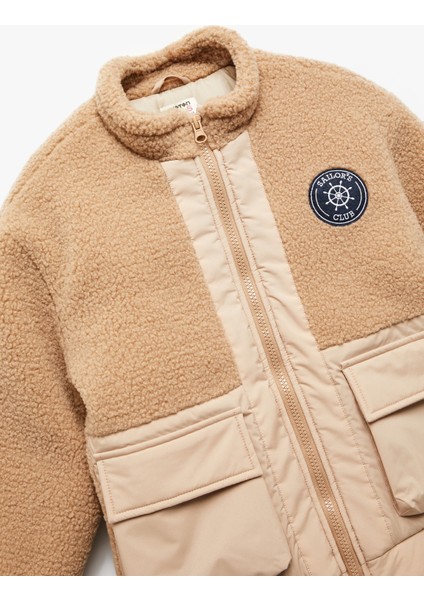 Uzun Kollu Dik Yaka Fermuarlı Cepli Polar Detaylı Ceket modelleri