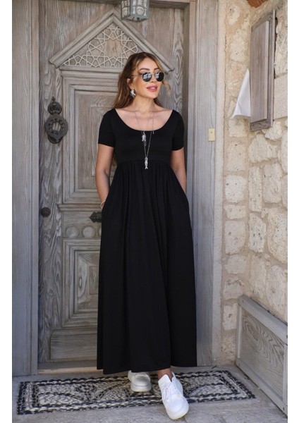Kadın Kısa Kollu Yuvarlak Yaka Önden Yırtmaçlı Cepli Viskon Uzun Elbise modelleri