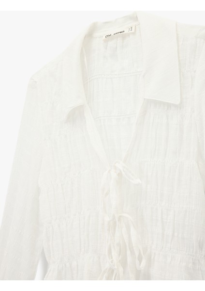 Fiyonklu Bağlama Detaylı Uzun Balon Kollu Gömlek Yaka Ekoseli Bluz modelleri