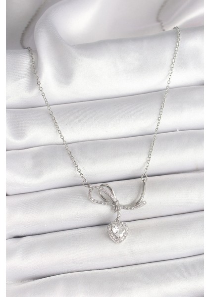 316L Çelik Gümüş Renk Zincir Zirkon Taşlı Düğüm Sallantı Kalp Figür Kadın Kolye fiyatları