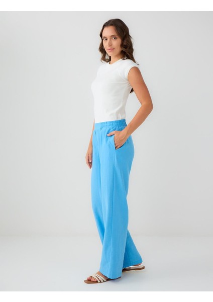 Mavi Normal Paça Beli Lastikli Dokuma Pantolon fiyatları