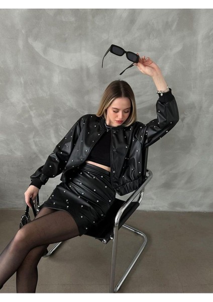 Siyah Taş Detaylı Suni Deri Etek fiyatları