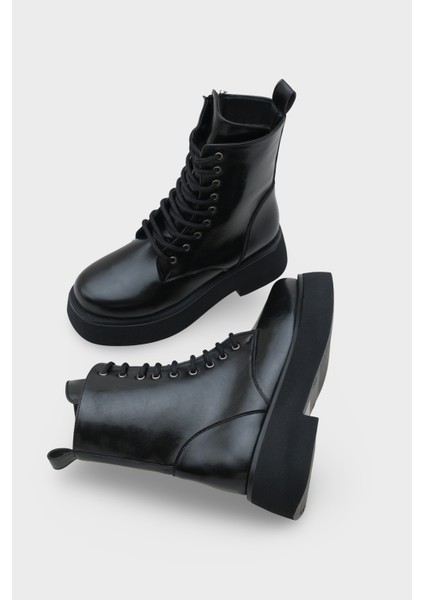 Melessa Yuvarlak Burunlu Yandan Fermuarlı Trak Tabanlı Kadın Bot indirimleri