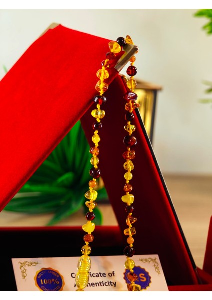 Damla Kehribar Bebek Kolye Şifa Kaynağı Özel Işçilik ve Dizayn Sertifikalı modelleri