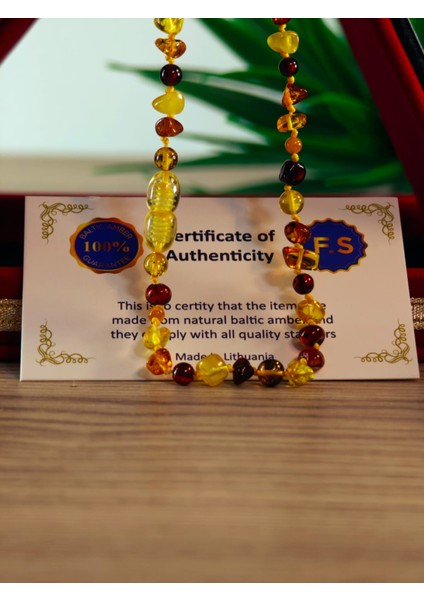 Damla Kehribar Bebek Kolye Şifa Kaynağı Özel Işçilik ve Dizayn Sertifikalı fırsatları