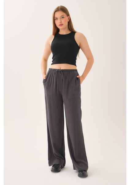 Beli Lastikli Ipek Dokulu Pantolon