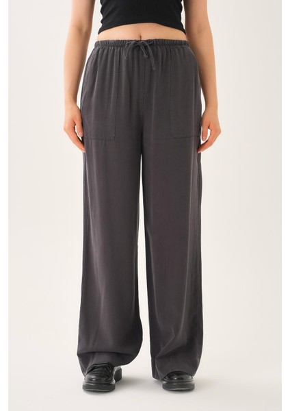 Beli Lastikli Ipek Dokulu Pantolon fiyatları