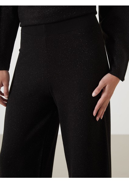 Yeni Sezon Beli Lastikli Parlak Görünümlü Kadın Triko Pantolon modelleri