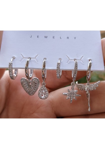 Çelik Melek Detaylı Çoklu Küpe Seti fırsatları