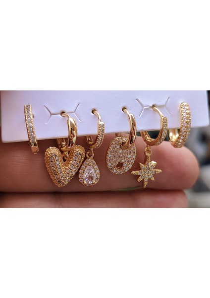 Çelik Kalp Detaylı Çoklu Kadın Küpe modelleri