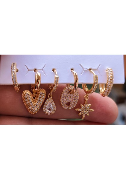 Çelik Kalp Detaylı Çoklu Kadın Küpe fırsatları