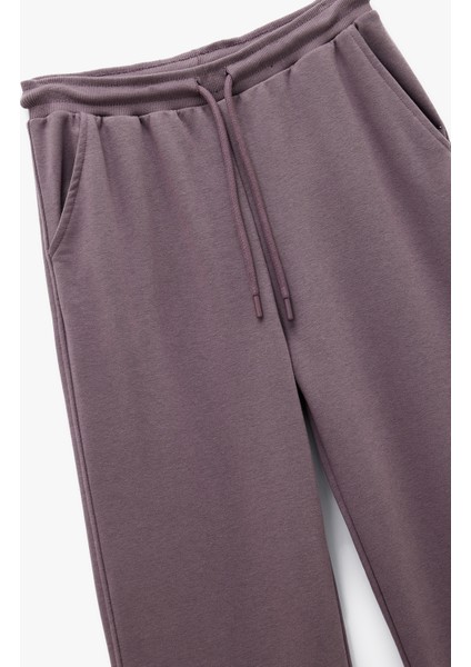 Rahat Kalıp Cep Detaylı Beli Bağcıklı Geniş Paça Eşofman Altı modelleri