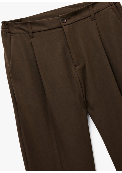 Rahat Kalıp Cepli Viskon Karışımlı Pileli Kumaş Pantolon modelleri