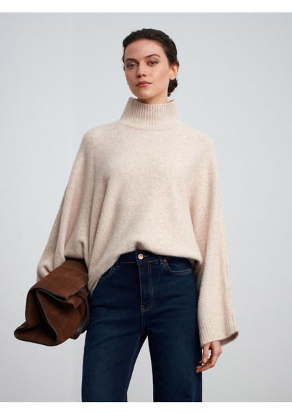 10817 Yarasa Kol Yün Karışımlı Triko Kazak-A.bej Mel. indirimleri