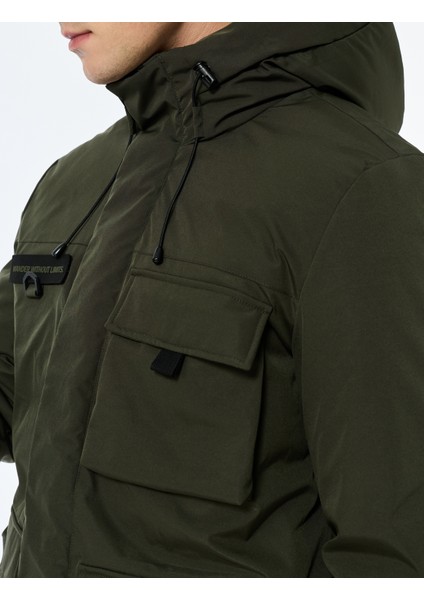 Uzun Kollu Kapaklı Cepli Fermuarlı Kapşonlu Kışlık Parka indirimleri