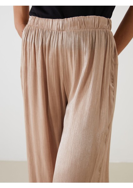 Yeni Sezon Beli Lastikli Parlak Görünümlü Kadın Pantolon modelleri