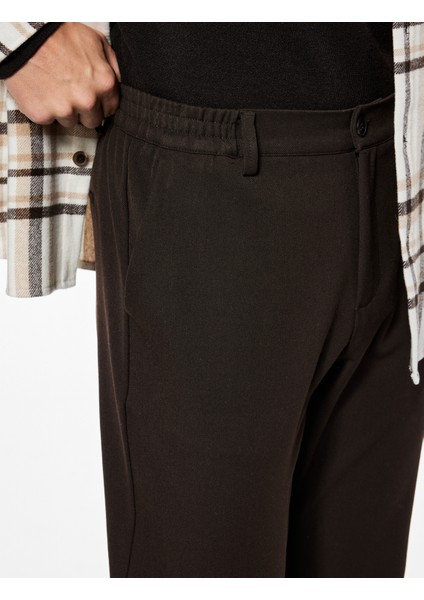 Regular Fit Beli Lastikli Cepli Viskon Karışımlı Kumaş Pantolon indirimleri