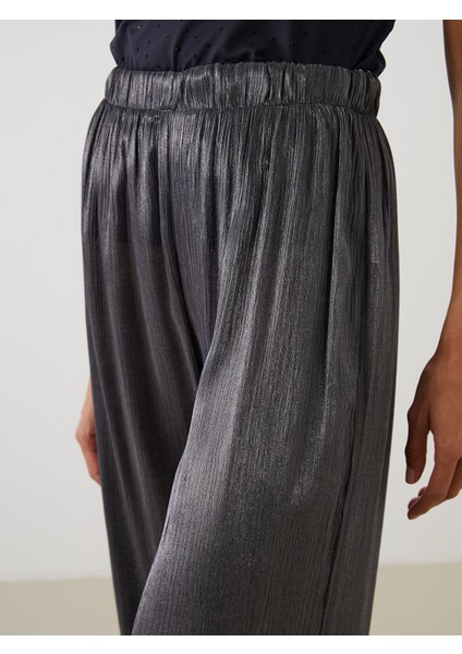 Yeni Sezon Beli Lastikli Parlak Görünümlü Kadın Pantolon modelleri