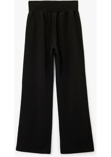 Rahat Kalıp Yüksek Bel Bağcıklı Cep Detaylı Geniş Paça Eşofman Altı fiyatları