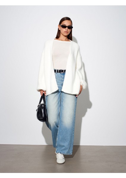 60991 Yumuşak Dokulu Dökümlü Triko Hırka-Ekru indirimleri