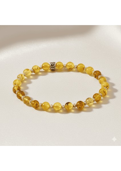 Dorika Top Süslemeli Küre Kesim Sarı Renk Fosilli Doğal Damla Kehribar Kadın Bileklik indirimleri