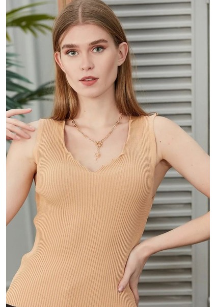 Merdiven Yaka Kolsuz Ince Yazlık Turuncu Triko Bluz fiyatları