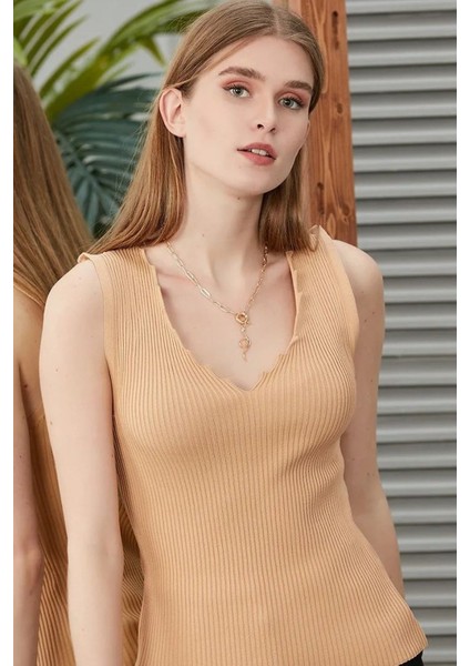 Merdiven Yaka Kolsuz Ince Yazlık Turuncu Triko Bluz fırsatları