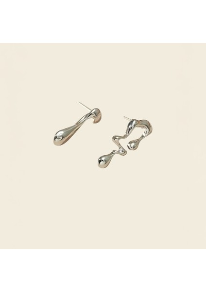 Modern Sanatsal Kadın Küpe – Asimetrik Damlacık Tasarımlı Gümüş Renk Zarif Küpe fiyatları