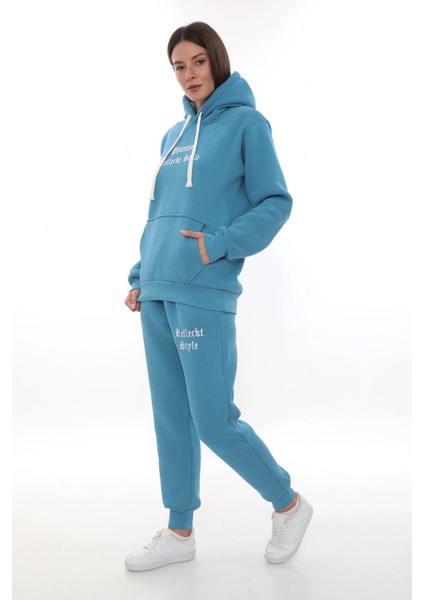 Turkuaz Polarlı Şık Kadın Eşofman Takımı Paça Lastikli Cepli Kapüşonlu Nakış Detaylı Compact Takım fiyatları