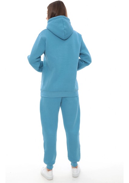 Turkuaz Polarlı Şık Kadın Eşofman Takımı Paça Lastikli Cepli Kapüşonlu Nakış Detaylı Compact Takım modelleri