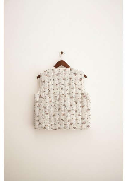 Kız Çocuk Pamuklu Krem Çiçek Desenli Bağlamalı Yelek - Yumuşak Dokulu, Astarlı Tasarım fiyatları