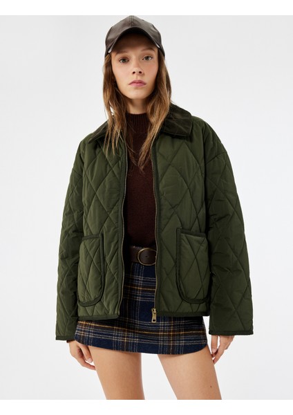 Uzun Kollu Fermuarlı Cep Detaylı Klasik Yaka Kapitone Ceket fiyatları