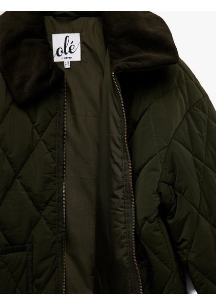 Uzun Kollu Fermuarlı Cep Detaylı Klasik Yaka Kapitone Ceket