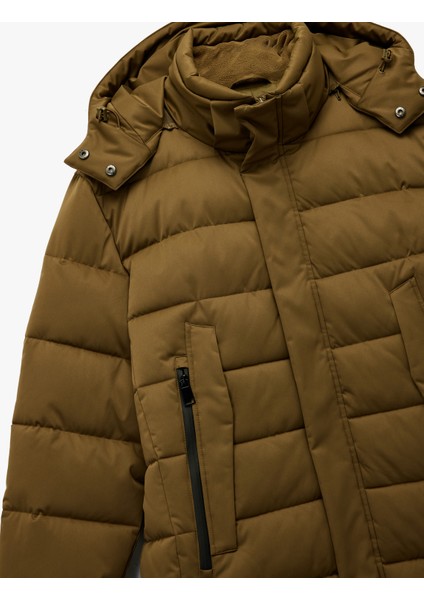 Uzun Kollu Cepli Kapşonlu Uzun Şişme Mont