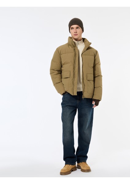 Uzun Kollu Kapaklı Cep Detaylı Fermuarlı Slim Fit Dik Yaka Kışlık Şişme Mont modelleri