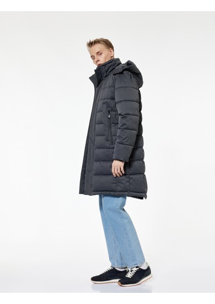 Uzun Kollu Cepli Kapşonlu Uzun Şişme Mont fiyatları