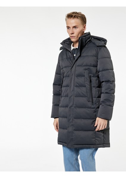 Uzun Kollu Cepli Kapşonlu Uzun Şişme Mont modelleri