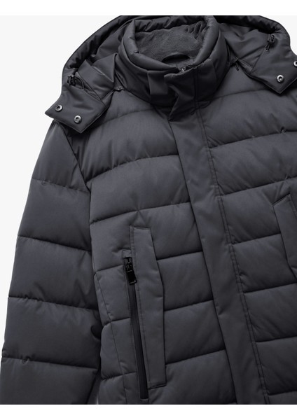 Uzun Kollu Cepli Kapşonlu Uzun Şişme Mont