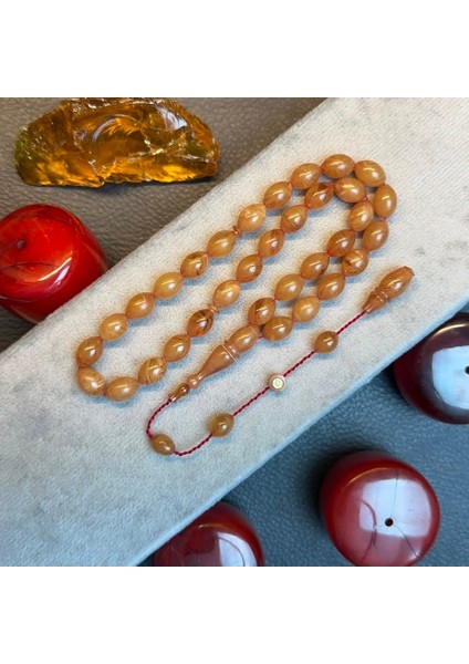 Abdullah Karataş Imzalı Hareli Sarı Renkli Sıkma Kehribar Tesbih fiyatları