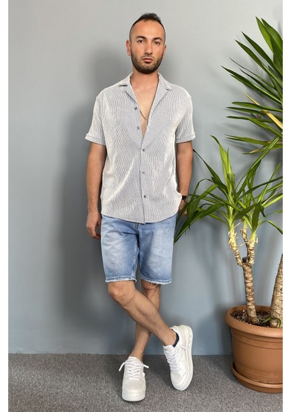 Kısa Kollu Jakarlı Mavi Gömlek indirimleri