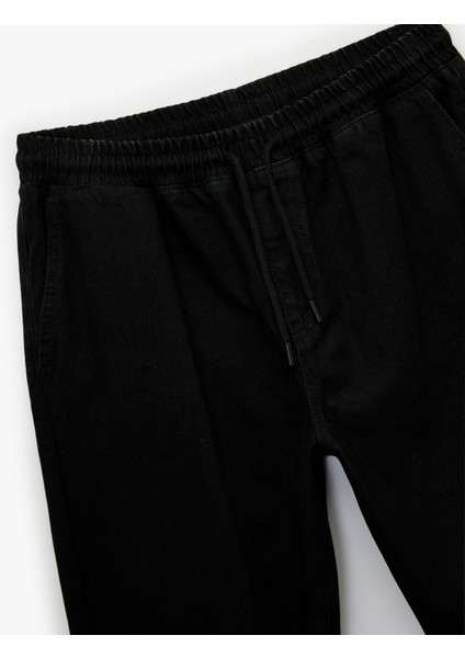 Pamuklu Cepli Regular Fit Beli Bağcıklı Jean Pantolon modelleri