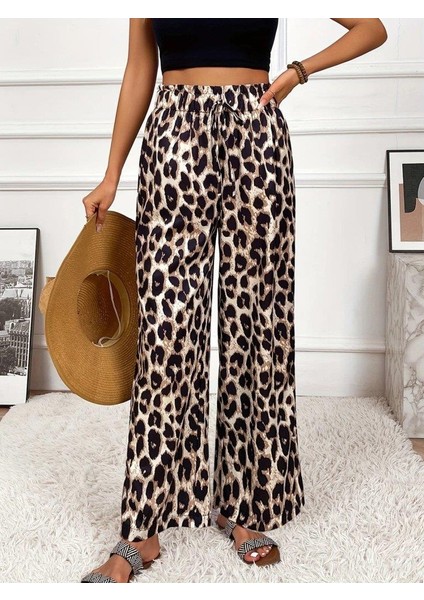 Kadın Yüksek Bel Beli Lastikli Bağcıklı Leopar Desenli Süprem Pantolon modelleri