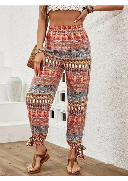 Kadın Yüksek Belli Yanlardan Yırtmaç Detaylı Desenli Bürümcük Pantolon modelleri