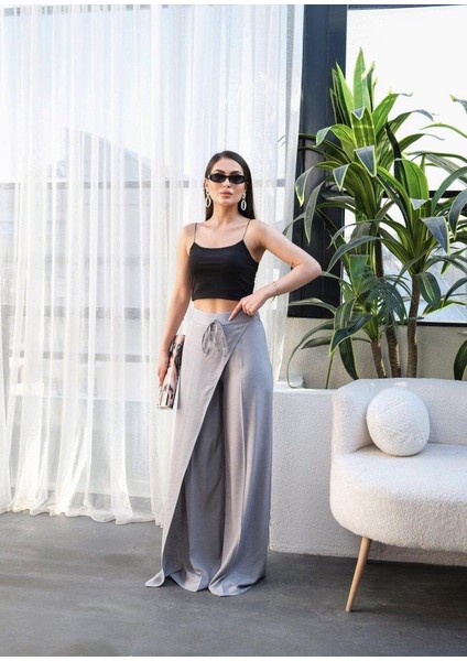 Keten Önü Çapraz Parçali Lasti̇kli̇ ve Bağcikli Geni̇ş Paça Pantolon